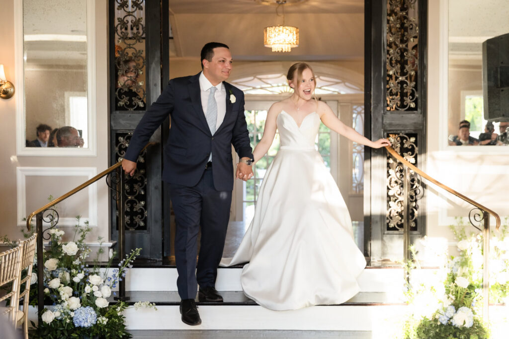 Lydia and Robbie make their grand entrance into their wedding reception at The Briarcliff Manor.