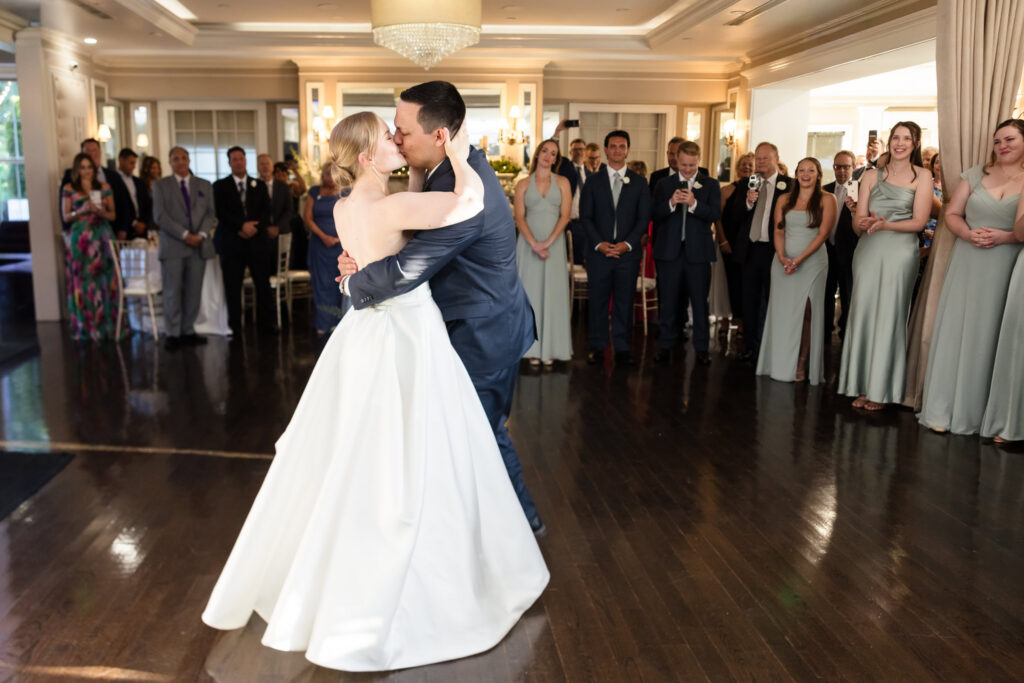 Lydia and Robbie share their first dance surrounded by family and friends at their Briarcliff Manor wedding reception.