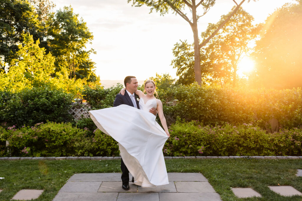Lydia and Robbie enjoy golden hour wedding portraits in the garden.