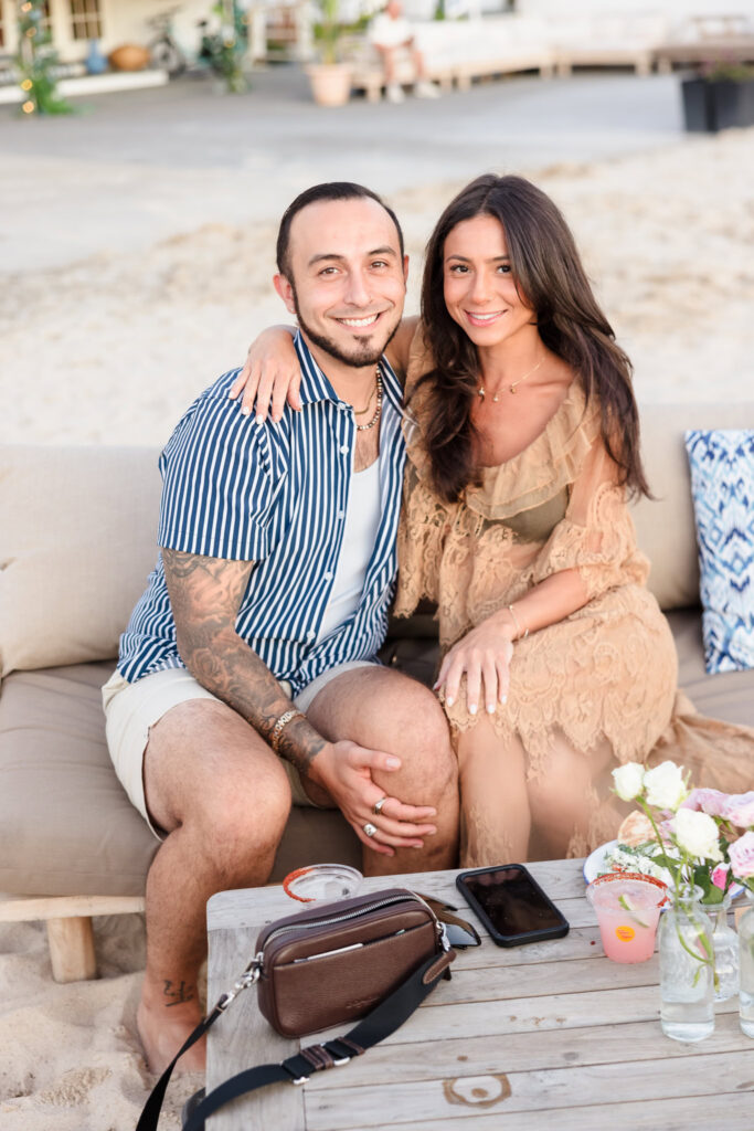 Couple seated together during a relaxed waterfront celebration at EHP Resort and Marina.