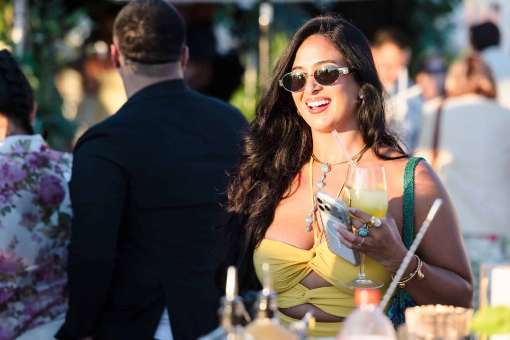 Guest enjoying a cocktail during the East End wedding community event at EHP Resort.
