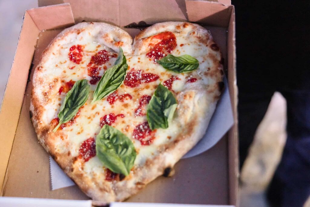 Heart-shaped pizza with fresh basil served at hamptonBRIDE’s A Toast to Summer event at EHP Resort in East Hampton.