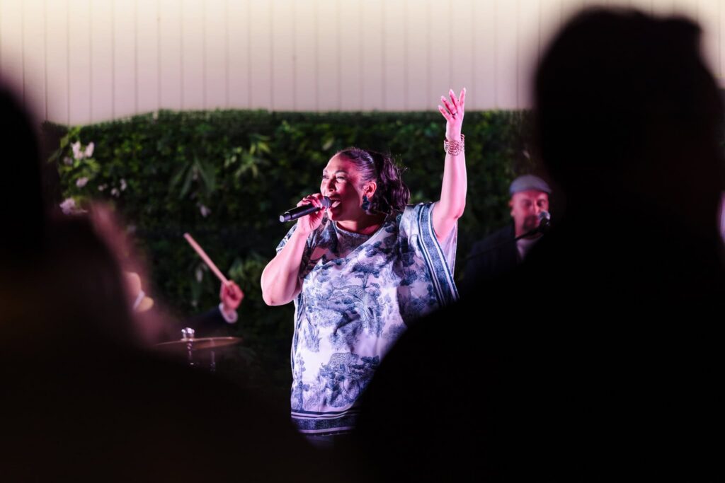Live singer performs for wedding industry guests during hamptonBRIDE’s A Toast to Summer at EHP Resort.